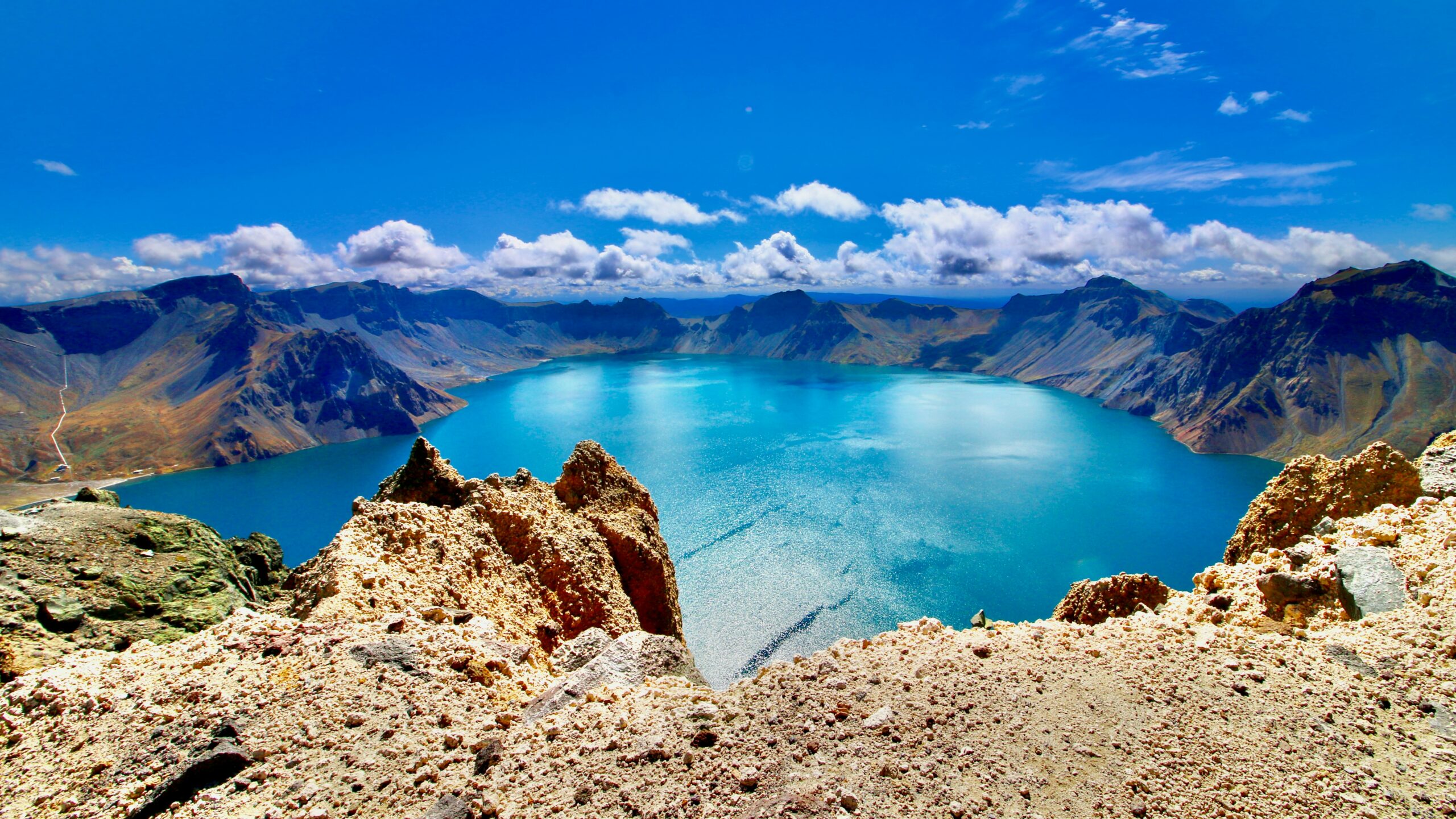 Witness the legendary Changbai Mountain Heavenly Lake, a volcanic wonder